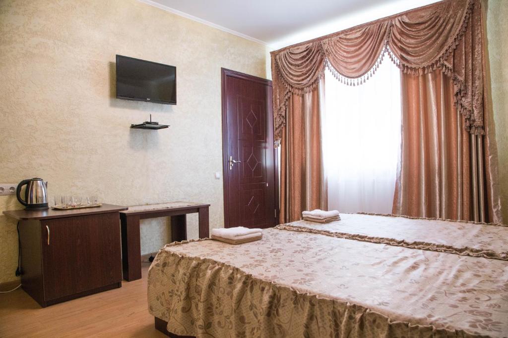 Postel nebo postele na pokoji v ubytování Guest House Montreal