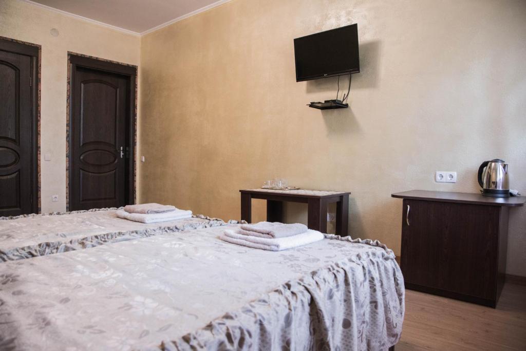 Postel nebo postele na pokoji v ubytování Guest House Montreal