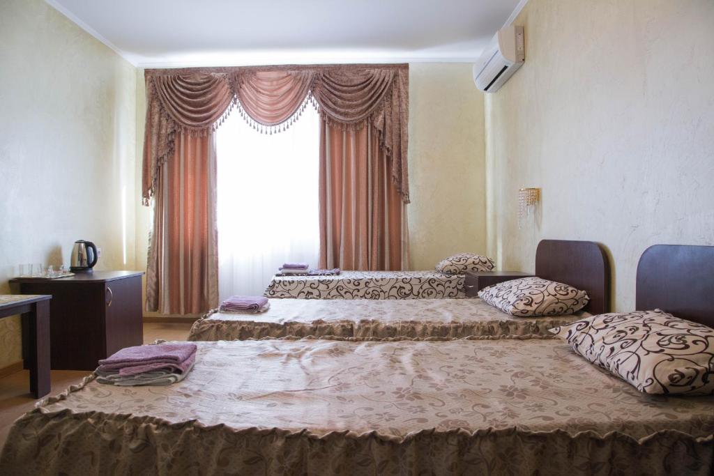 Postel nebo postele na pokoji v ubytování Guest House Montreal