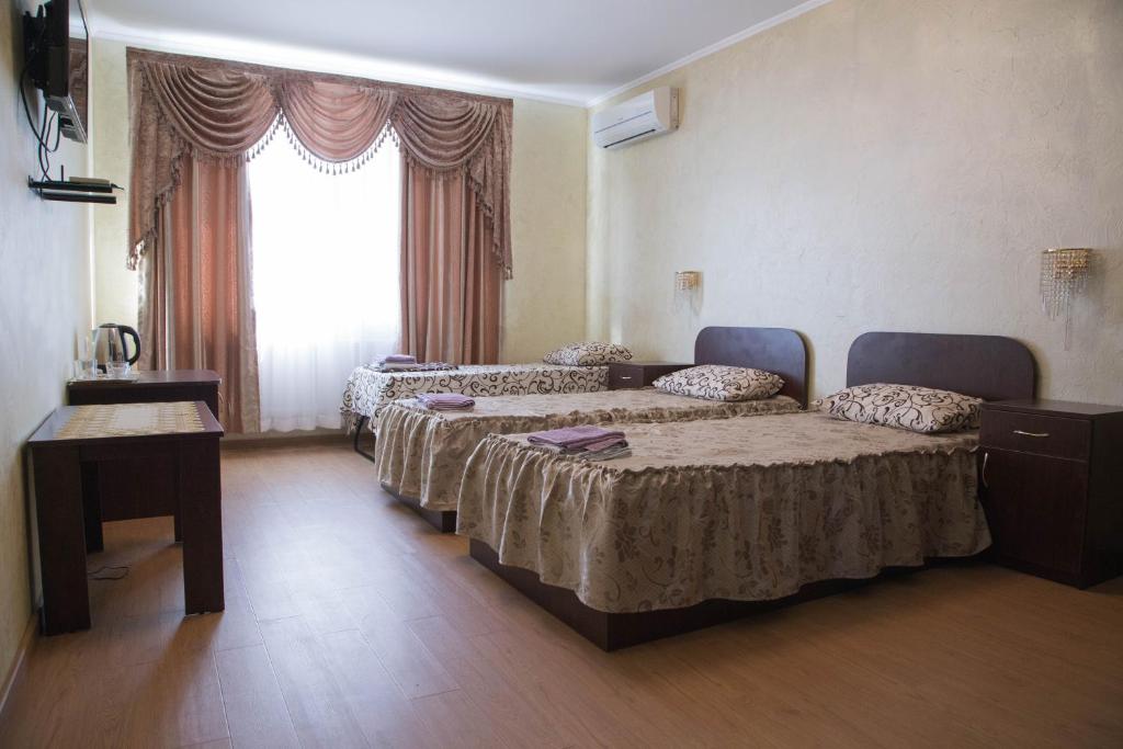 Postel nebo postele na pokoji v ubytování Guest House Montreal