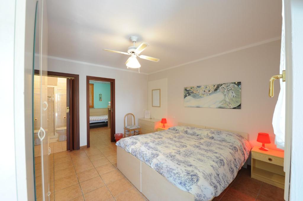 Postel nebo postele na pokoji v ubytování Hotel Villa Grazia