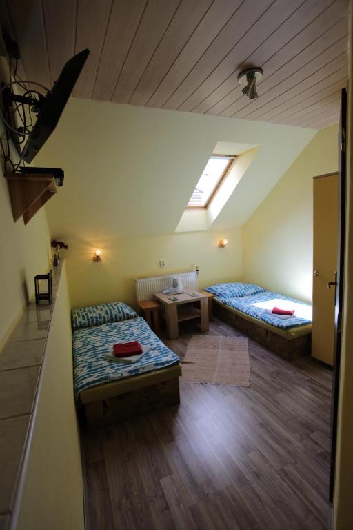 Postel nebo postele na pokoji v ubytování Ubytovanie Zuzana