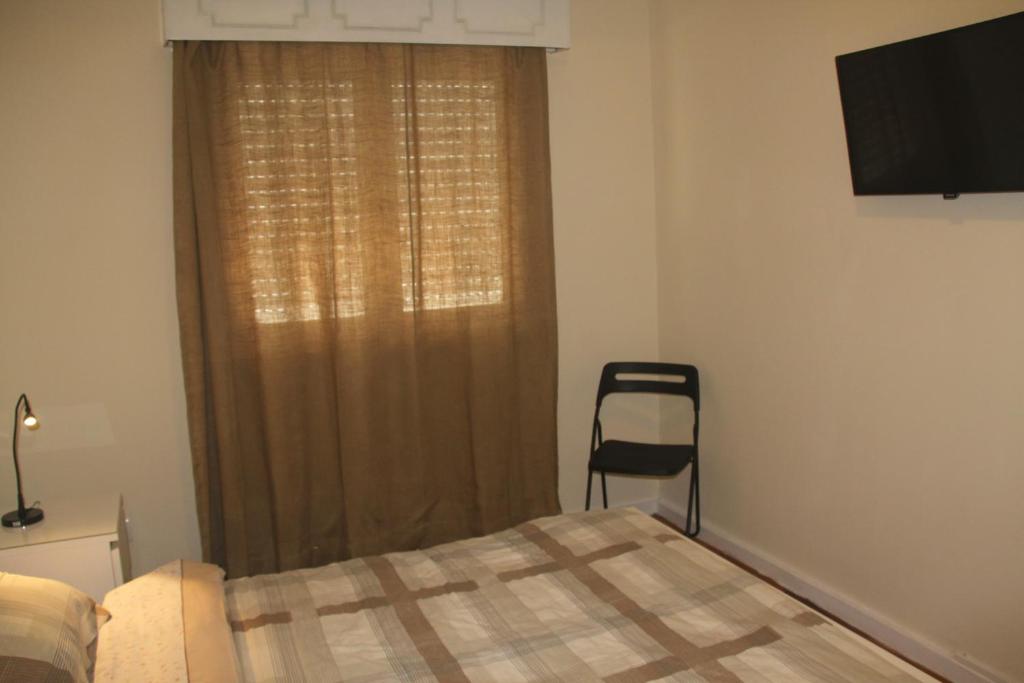 Postel nebo postele na pokoji v ubytování MicroRent Rooms