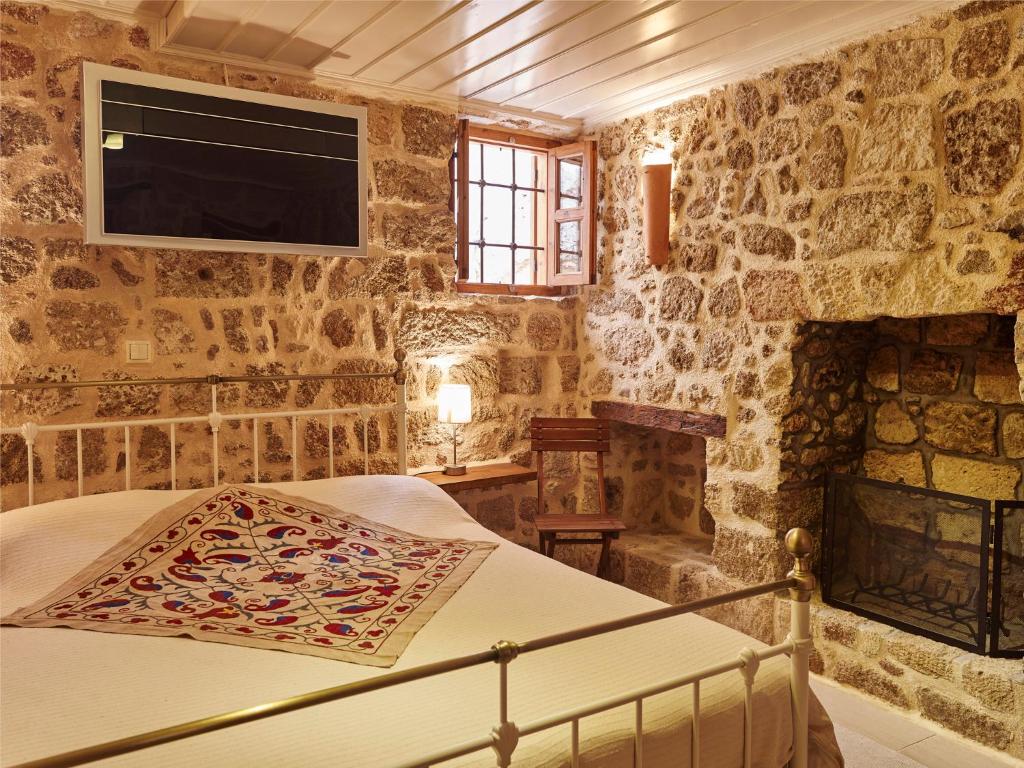 Postel nebo postele na pokoji v ubytování Helios Garden Boutique Apartments