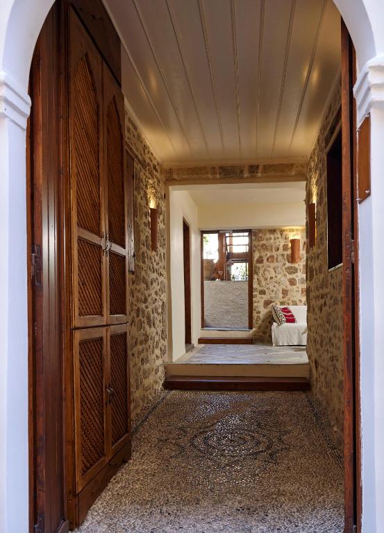 Postel nebo postele na pokoji v ubytování Helios Garden Boutique Apartments