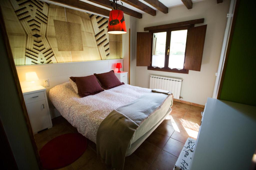 Cama o camas de una habitación en Casa Rural Andutza