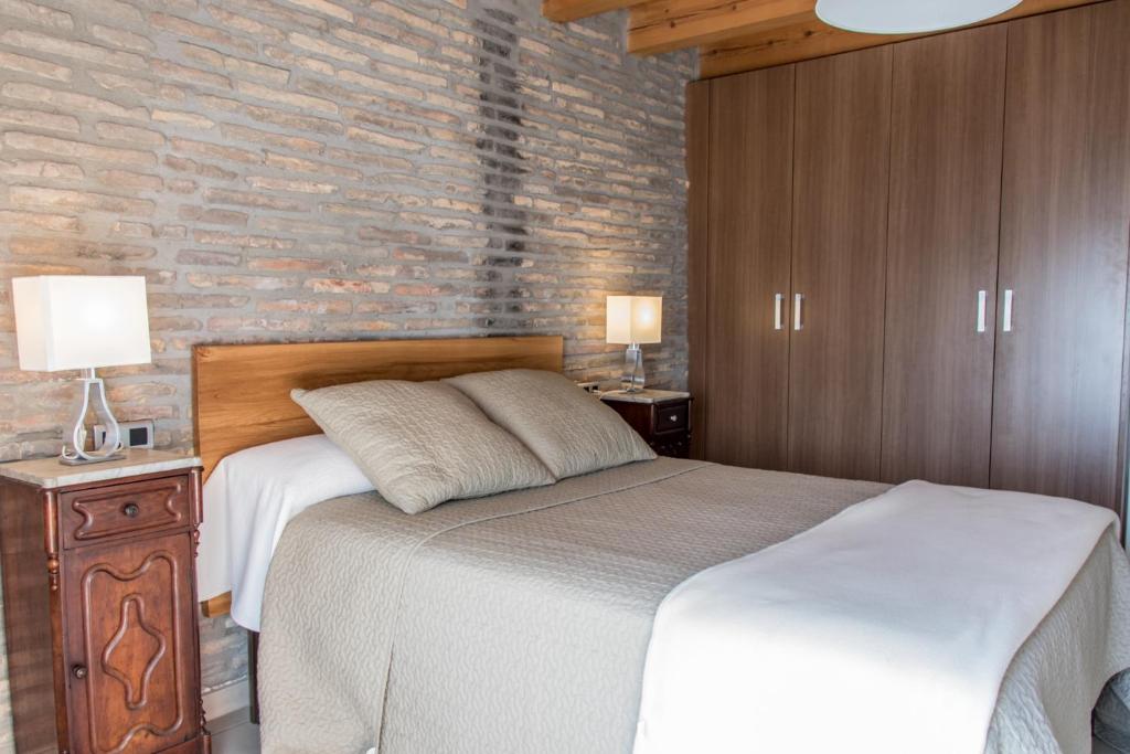 Postel nebo postele na pokoji v ubytování Plaza Apartamentos