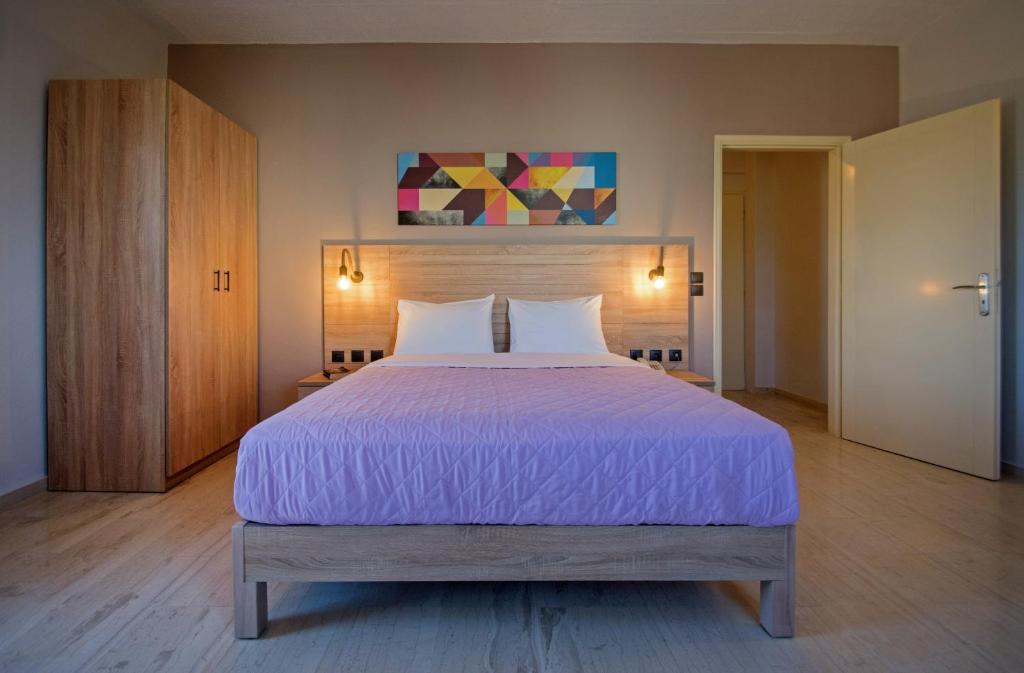 Posteľ alebo postele v izbe v ubytovaní Sirene Villas