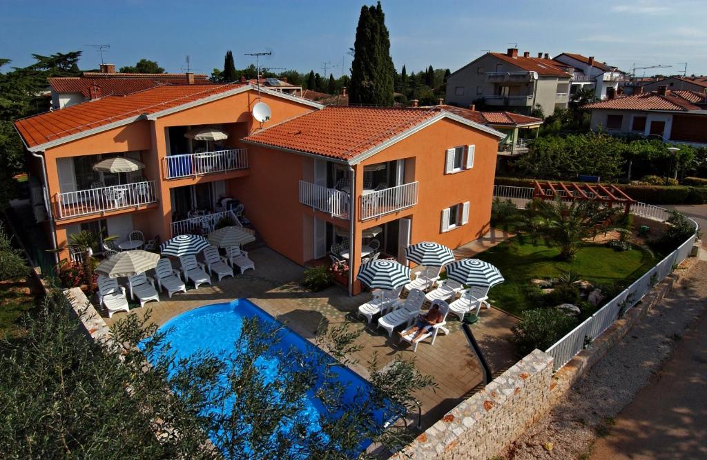 an aerial view of a house with a swimming pool at Villa Danex in Umag
