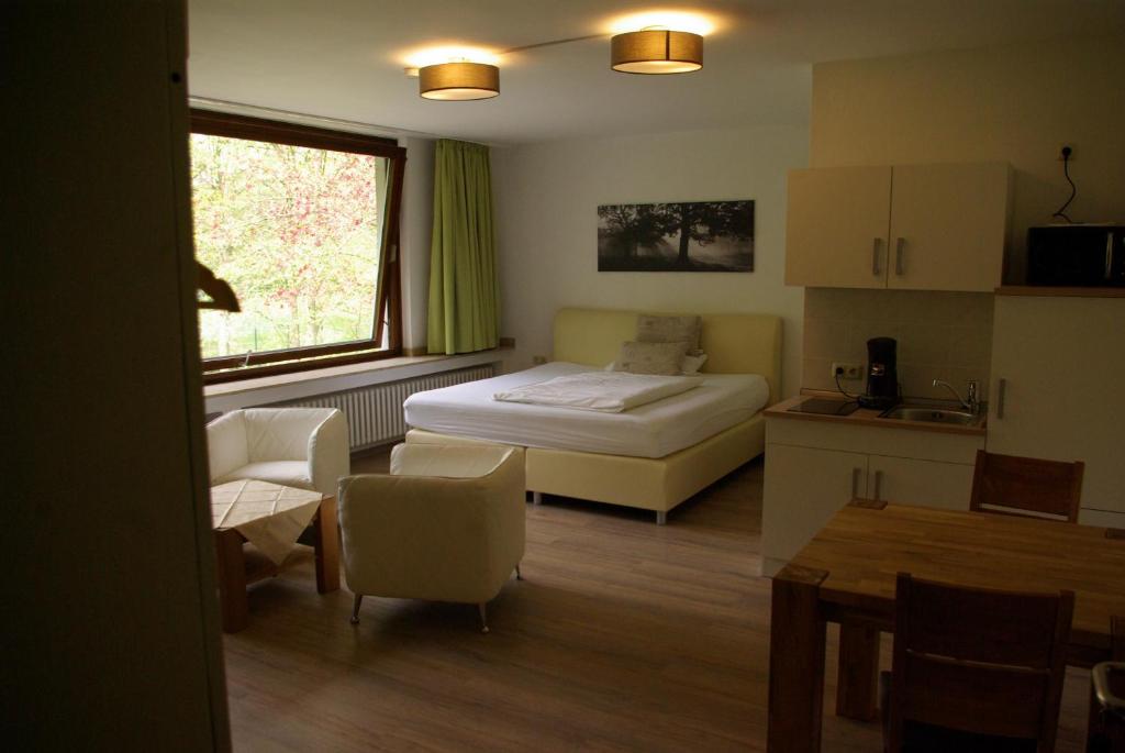 Postel nebo postele na pokoji v ubytování Gästehaus Schewe