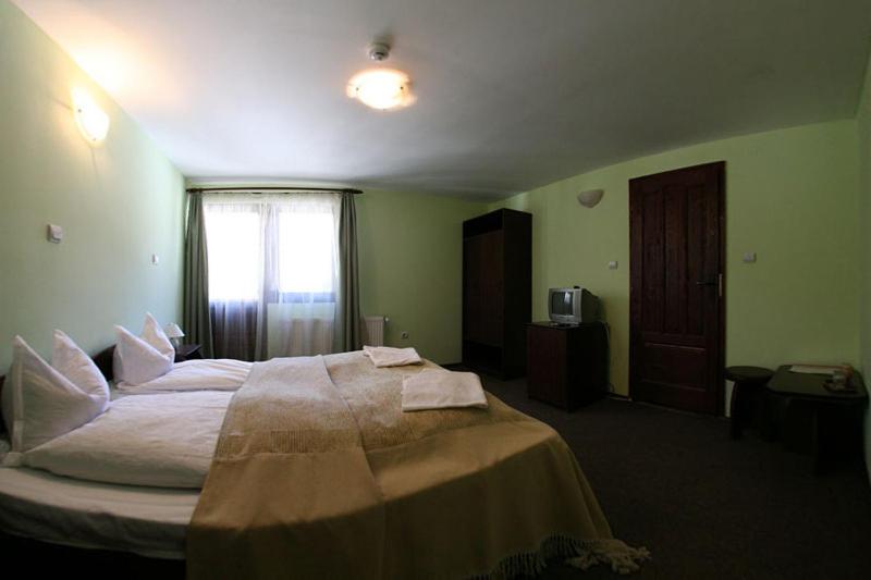Postel nebo postele na pokoji v ubytování Vila Gal