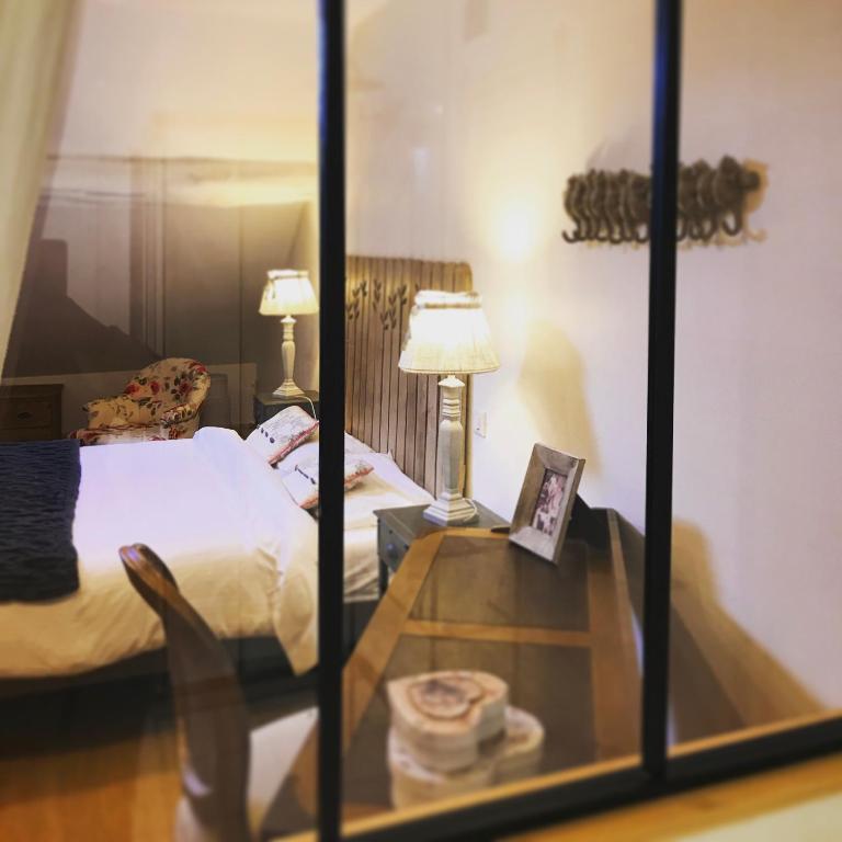 Postel nebo postele na pokoji v ubytování Maison & Tartine