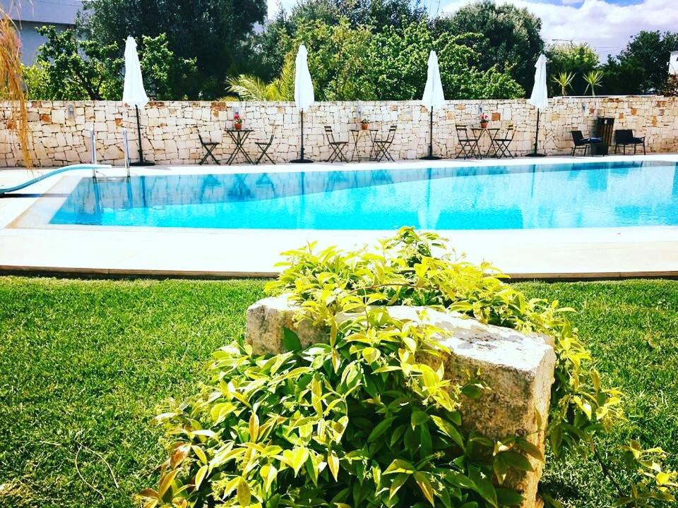 Bazén v ubytování Carone Suite-Charme&Pool nebo v jeho okolí