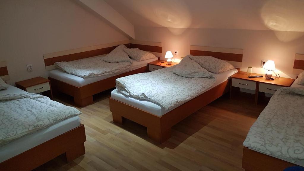 Postel nebo postele na pokoji v ubytování Guest house Kruna