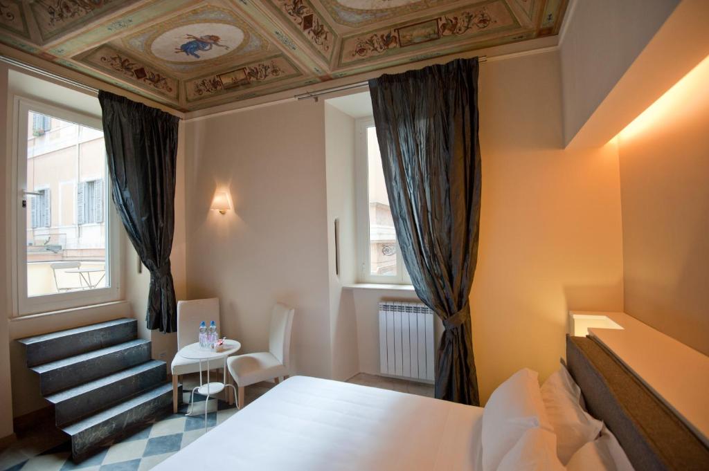 Letto o letti in una camera di Little Queen Suite