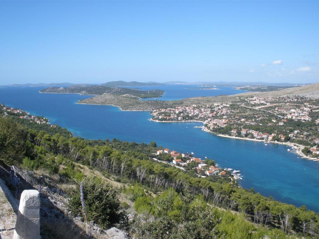 a view of a lake from a mountain at Apartments Ante-Gojko in Grebaštica