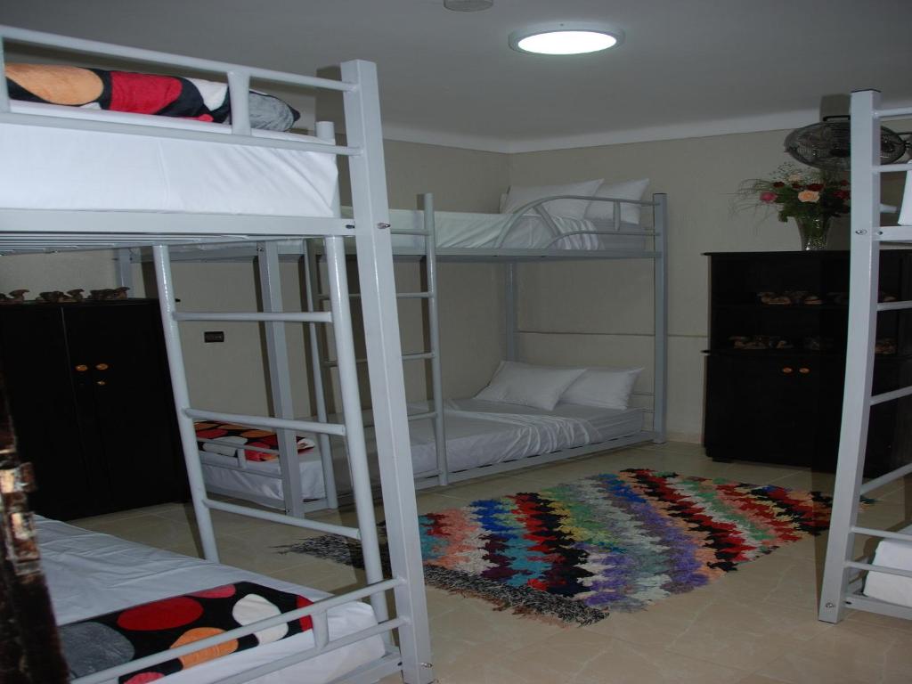 Postel nebo postele na pokoji v ubytování Kasbah Red Castel Hostel