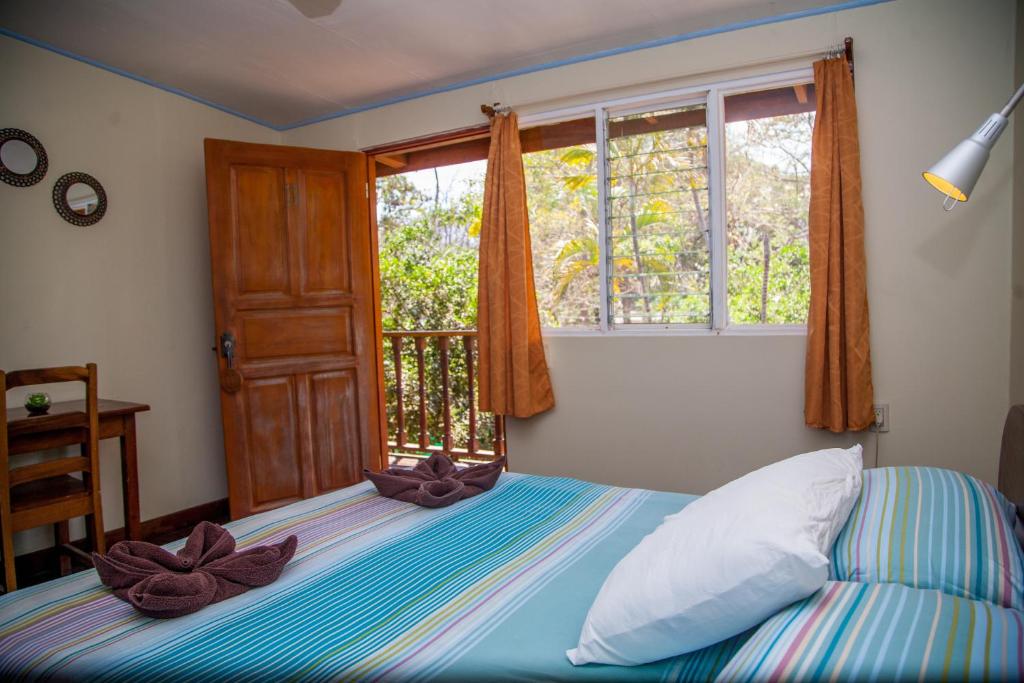 Postel nebo postele na pokoji v ubytování Hotel Brasilito