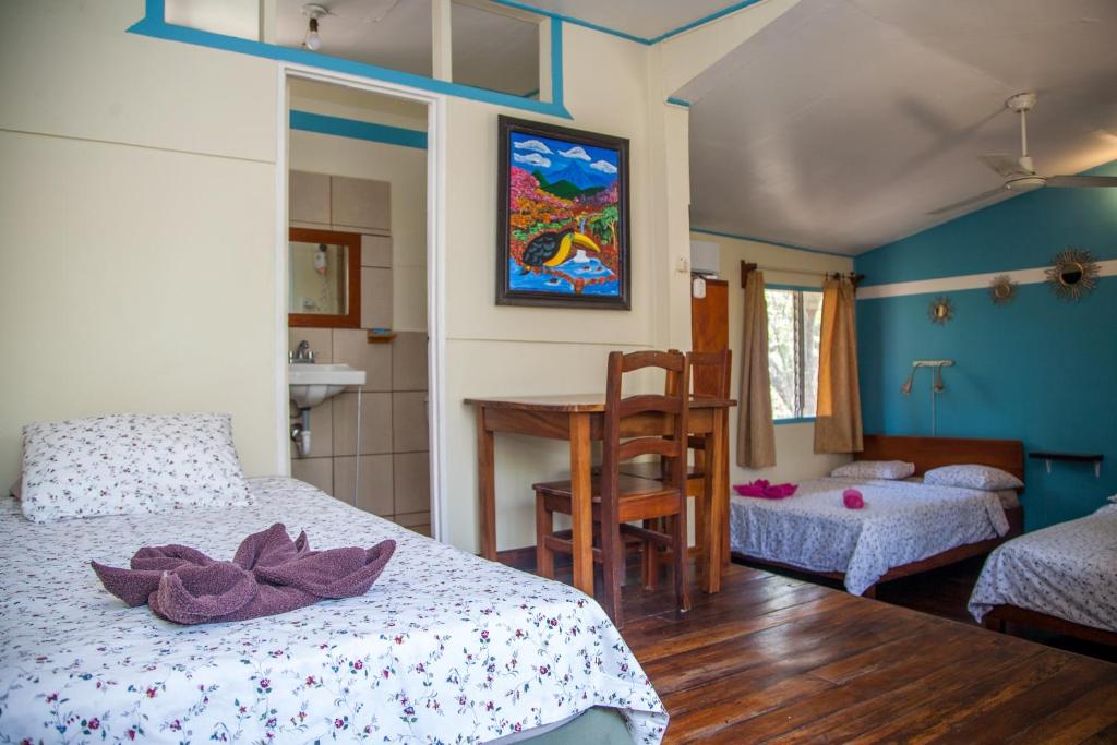 Postel nebo postele na pokoji v ubytování Hotel Brasilito