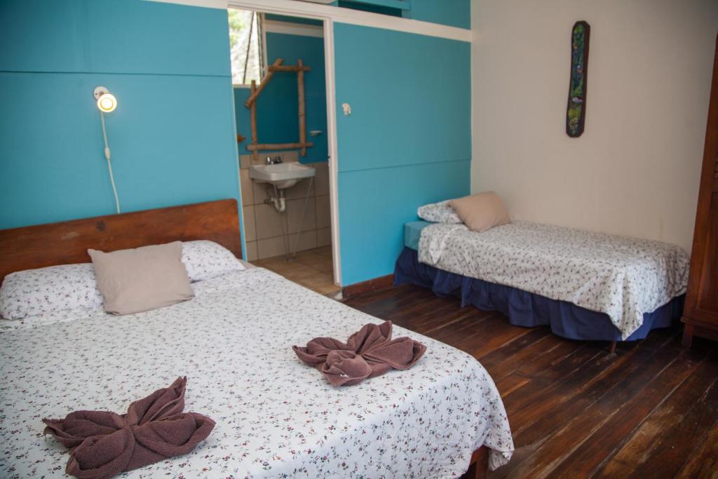 Postel nebo postele na pokoji v ubytování Hotel Brasilito