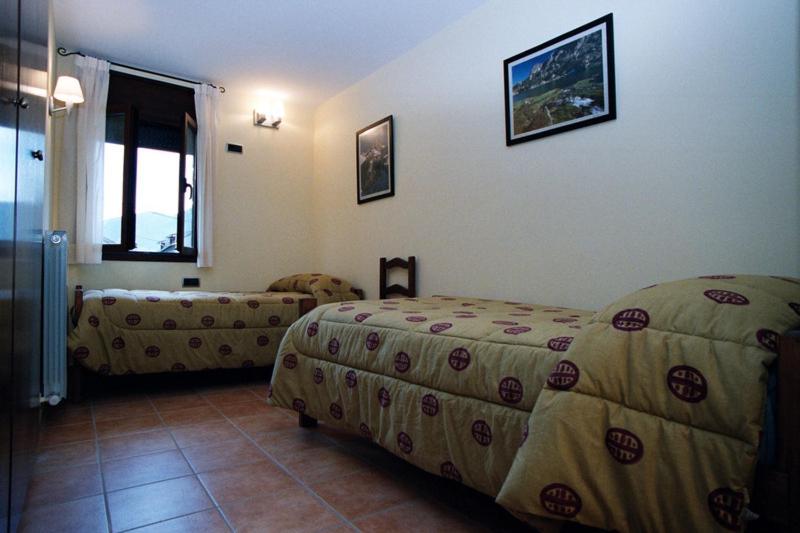 Posteľ alebo postele v izbe v ubytovaní Apartamentos Les Picardes