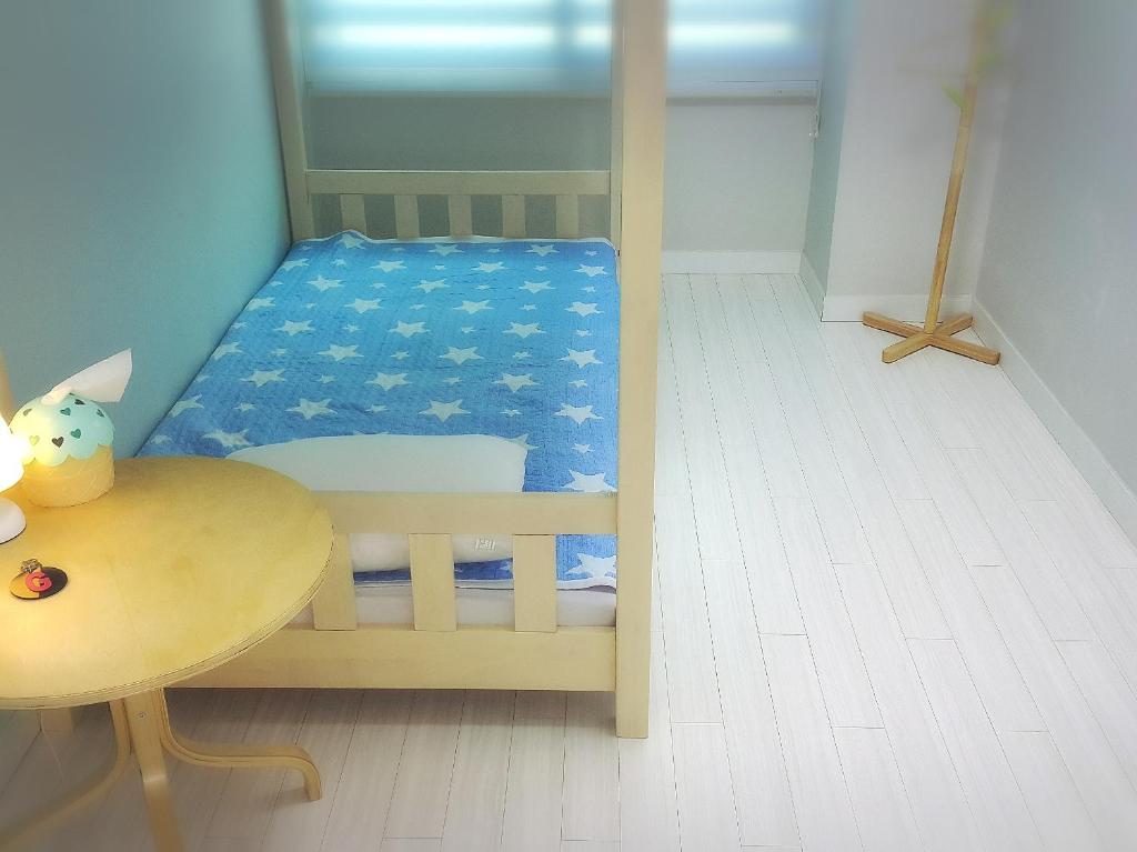 Postel nebo postele na pokoji v ubytování Cobe Guesthouse Dongdaemun