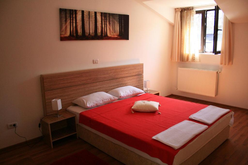 A bed or beds in a room at X Hostel Bucharest