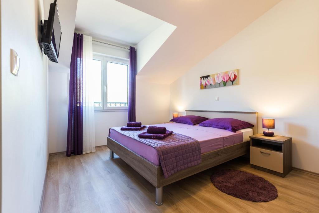 Postel nebo postele na pokoji v ubytování Apartment Marko