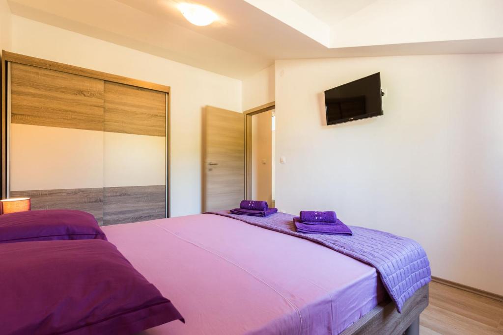 Postel nebo postele na pokoji v ubytování Apartment Marko