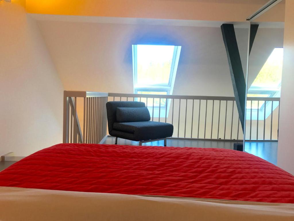 Postel nebo postele na pokoji v ubytování HAUS DOHRMANN - mit direktem Strandzugang,moderne, ruhig gelegene Ferienwohnungen mit Terrasse