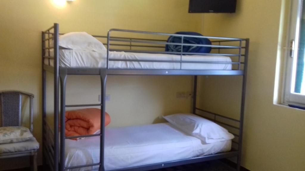 Postel nebo postele na pokoji v ubytování Albergo Caprile