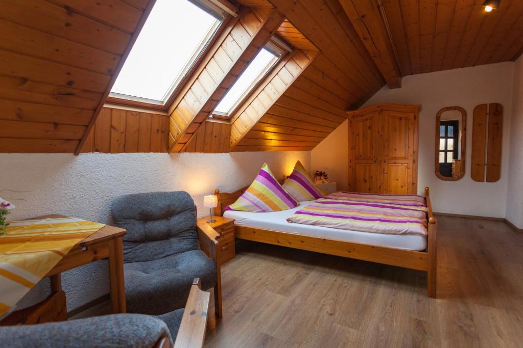 Postel nebo postele na pokoji v ubytování Pension Am Weinberg Sächsische Schweiz
