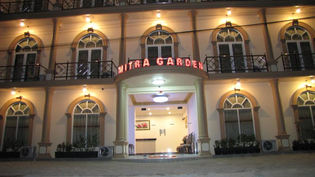 a building with a sign that reads niagara garden at Hotel Mitra Garden in Pangkal Pinang