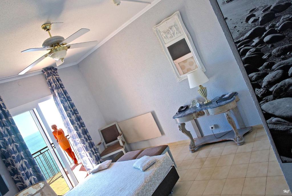 Postel nebo postele na pokoji v ubytování Hotel Grifeu