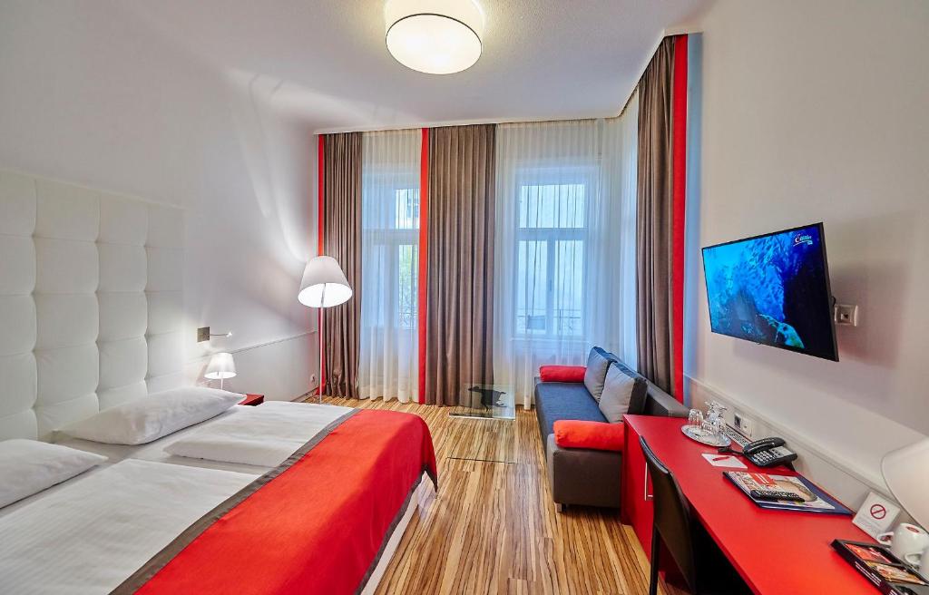 Llit o llits en una habitació de Hotel Zipser