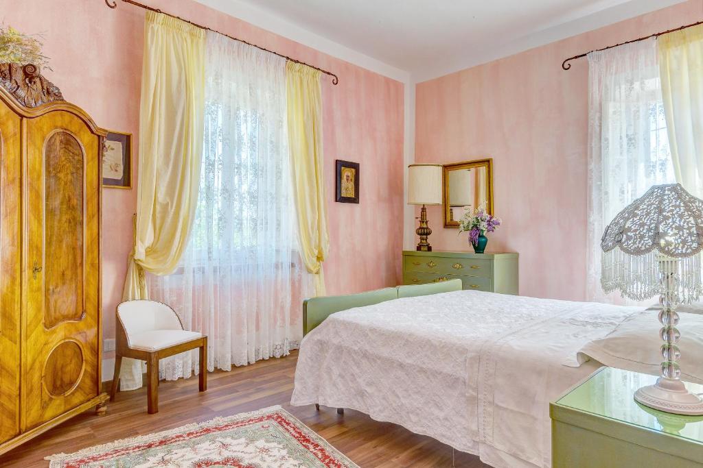 Postel nebo postele na pokoji v ubytování Le Stanze di Ebe
