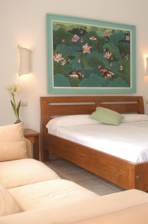Postel nebo postele na pokoji v ubytování Hotel Punta Sur