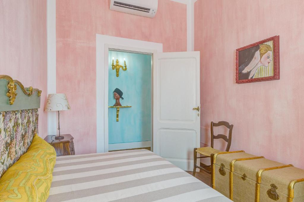 Postel nebo postele na pokoji v ubytování Le Stanze di Ebe