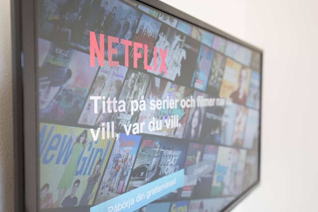 TV a/nebo společenská místnost v ubytování Hotell Eken Mölndal