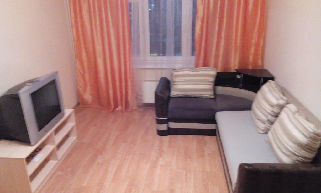 A seating area at Apartment on Nikolaya Fedorova 17