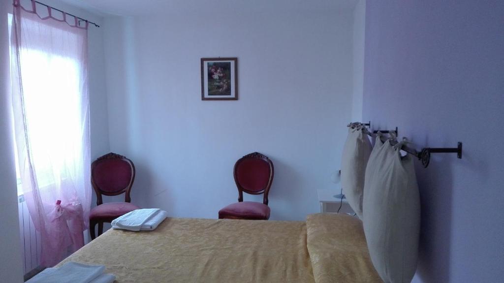 Postel nebo postele na pokoji v ubytování Hotel Paese Corvara