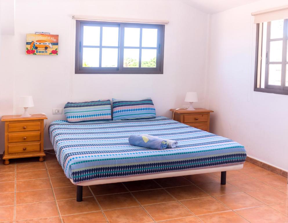 Postel nebo postele na pokoji v ubytování La Tortuga Hostel