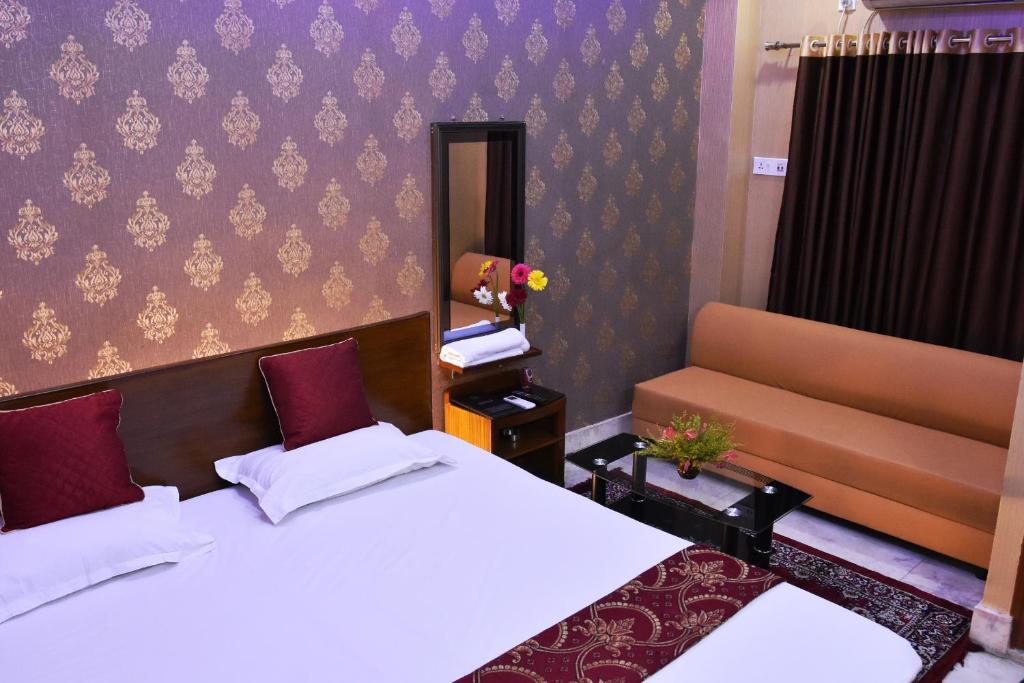 Postel nebo postele na pokoji v ubytování Hotel Gateway Continental