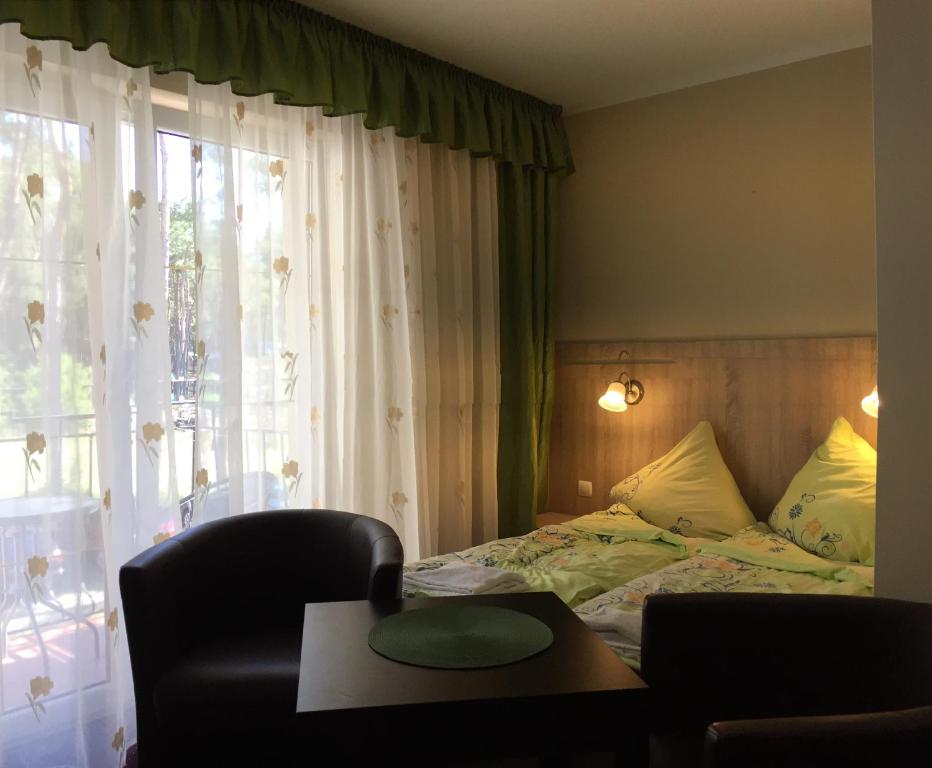 Posteľ alebo postele v izbe v ubytovaní Lazur Wellness@Spa
