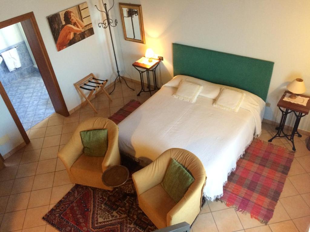 Postel nebo postele na pokoji v ubytování Relais Varnello