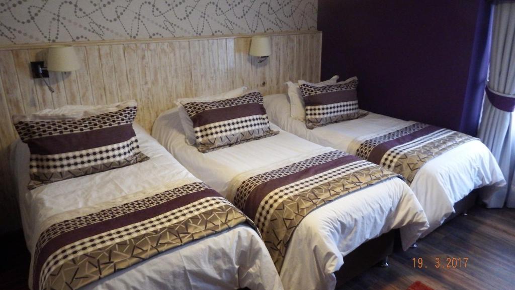 Postel nebo postele na pokoji v ubytování LV Hoteles Boutique