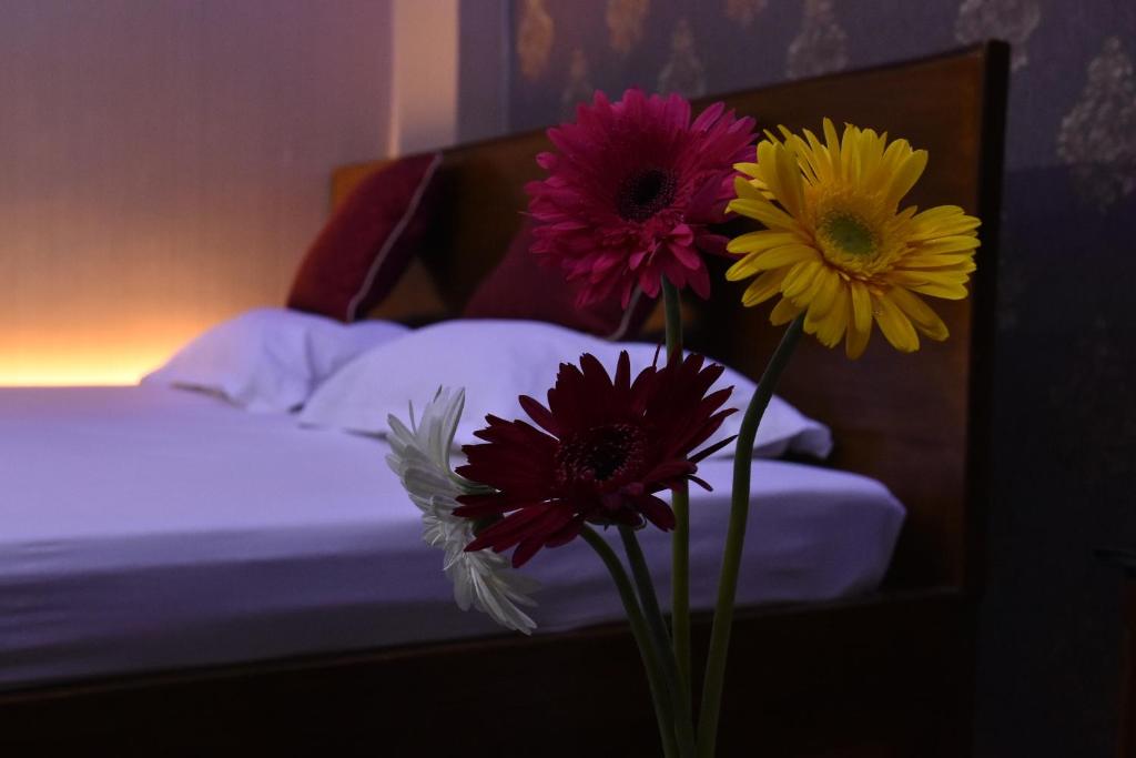 Postel nebo postele na pokoji v ubytování Hotel Gateway Continental