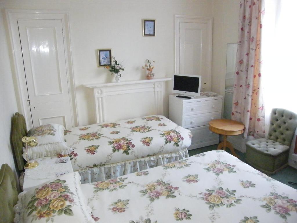 Postel nebo postele na pokoji v ubytování El Tabora Guest House