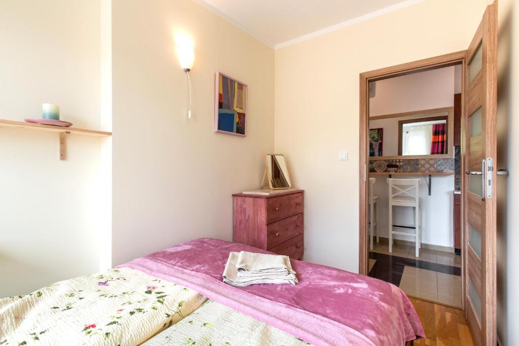 Postel nebo postele na pokoji v ubytování Blue Sky Apartment