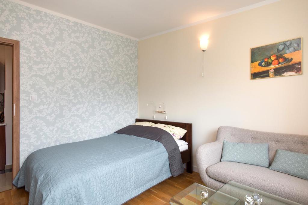 Postel nebo postele na pokoji v ubytování Blue Sky Apartment